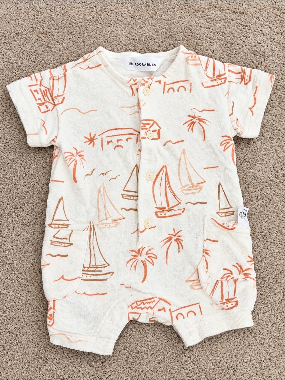 H&M Cream Baby One-Piece with Orange Sailboat Print